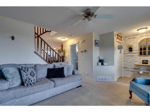 10 Silverado Plains Manor Sw, Calgary, AB - Indoor Photo Showing Living Room