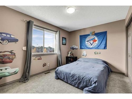 943 Bayside Drive Sw, Airdrie, AB - Indoor Photo Showing Bedroom