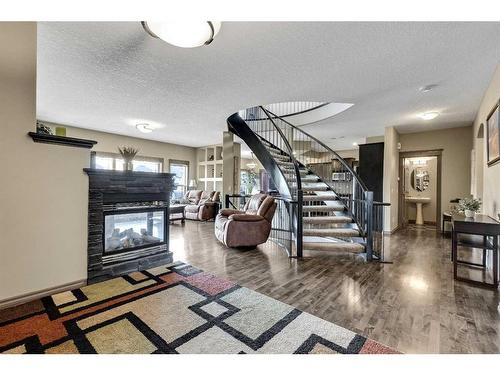 943 Bayside Drive Sw, Airdrie, AB - Indoor With Fireplace