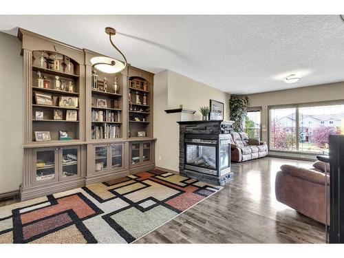 943 Bayside Drive Sw, Airdrie, AB - Indoor With Fireplace