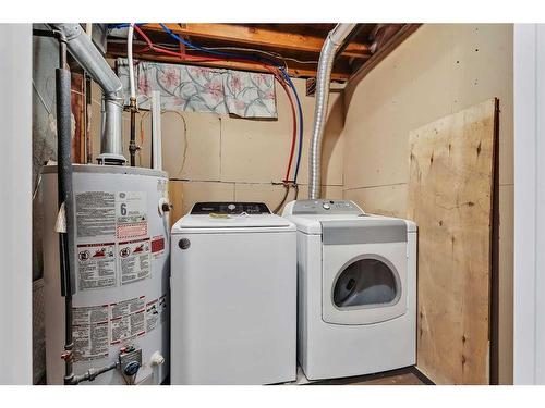 82 Taraglen Road Ne, Calgary, AB - Indoor Photo Showing Laundry Room