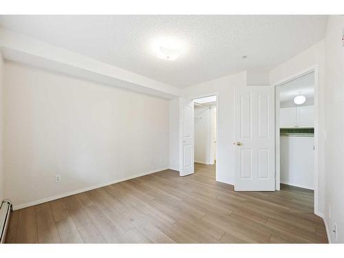 115-3000 Somervale Court Sw, Calgary, AB - Indoor Photo Showing Other Room