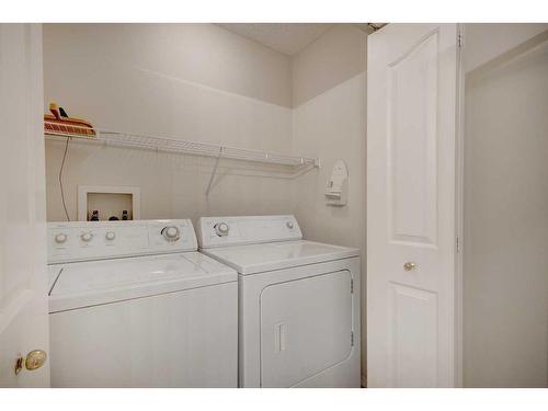 126 Mt Douglas Villas Se, Calgary, AB - Indoor Photo Showing Laundry Room