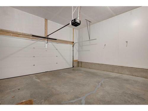 126 Mt Douglas Villas Se, Calgary, AB - Indoor Photo Showing Garage