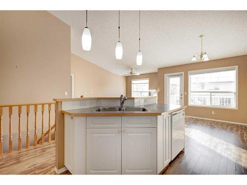 126 Mt Douglas Villas Se, Calgary, AB - Indoor Photo Showing Kitchen With Double Sink