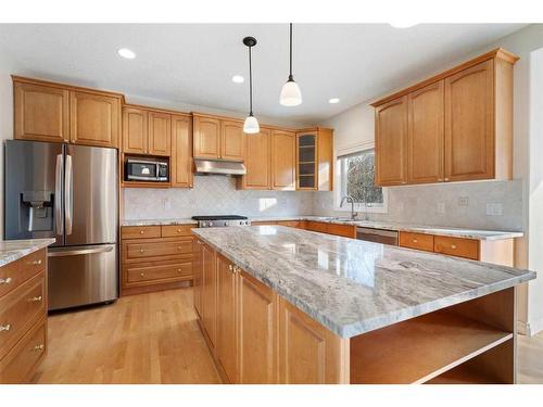 11 Evercreek Bluffs Road Sw, Calgary, AB - Indoor Photo Showing Kitchen With Stainless Steel Kitchen With Double Sink