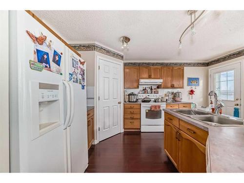 38 Somercrest Circle Sw, Calgary, AB - Indoor Photo Showing Kitchen With Double Sink