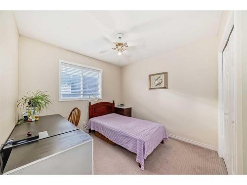 38 Somercrest Circle Sw, Calgary, AB - Indoor Photo Showing Bedroom