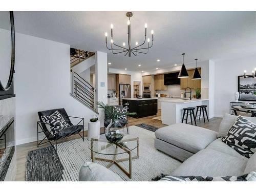 116 Ambleside Crescent Nw, Calgary, AB - Indoor Photo Showing Living Room With Fireplace