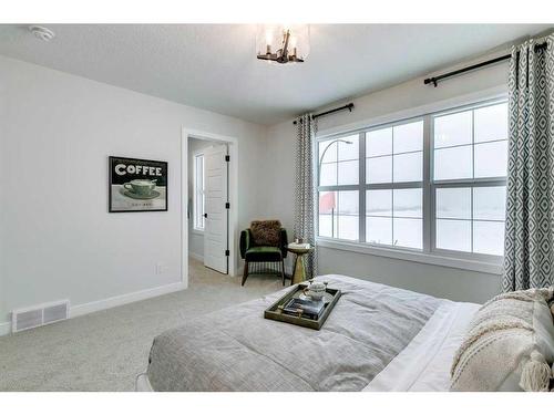 116 Ambleside Crescent Nw, Calgary, AB - Indoor Photo Showing Bedroom