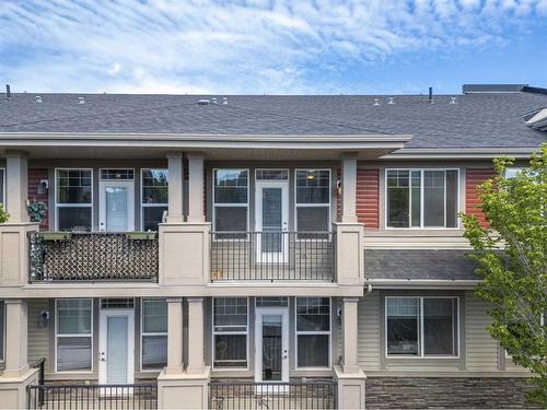 301-22 Panatella Road Nw, Calgary, AB - Outdoor With Facade