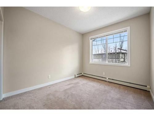 301-22 Panatella Road Nw, Calgary, AB - Indoor Photo Showing Other Room