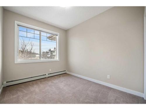 301-22 Panatella Road Nw, Calgary, AB - Indoor Photo Showing Other Room