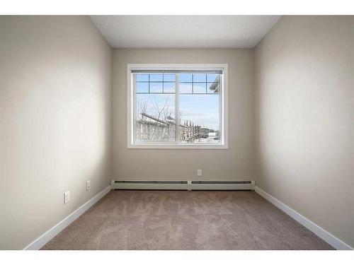 301-22 Panatella Road Nw, Calgary, AB - Indoor Photo Showing Other Room