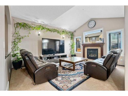 31 Skyview Shores Gardens Ne, Calgary, AB - Indoor Photo Showing Living Room With Fireplace