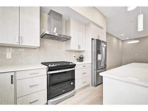 335 Magnolia Drive Se, Calgary, AB - Indoor Photo Showing Kitchen With Upgraded Kitchen