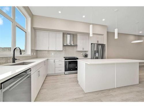 335 Magnolia Drive Se, Calgary, AB - Indoor Photo Showing Kitchen With Stainless Steel Kitchen With Upgraded Kitchen