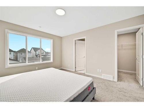 335 Magnolia Drive Se, Calgary, AB - Indoor Photo Showing Bedroom