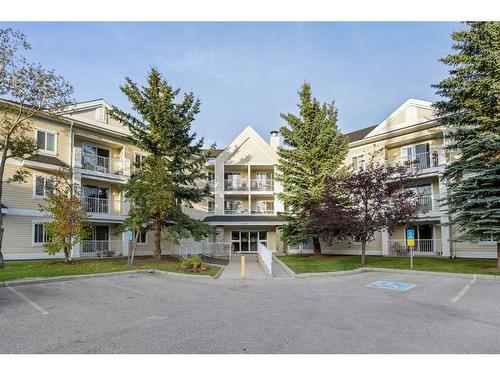 2210-11 Chaparral Ridge Drive Se, Calgary, AB - Outdoor With Balcony With Facade