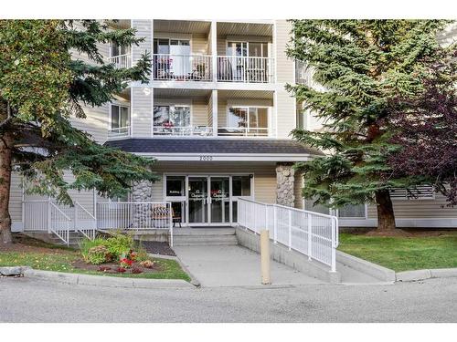 2210-11 Chaparral Ridge Drive Se, Calgary, AB - Outdoor With Balcony With Facade