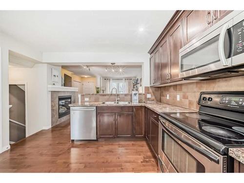 91 Auburn Bay Boulevard Se, Calgary, AB - Indoor Photo Showing Kitchen With Stainless Steel Kitchen