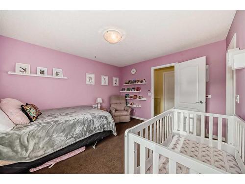 91 Auburn Bay Boulevard Se, Calgary, AB - Indoor Photo Showing Bedroom