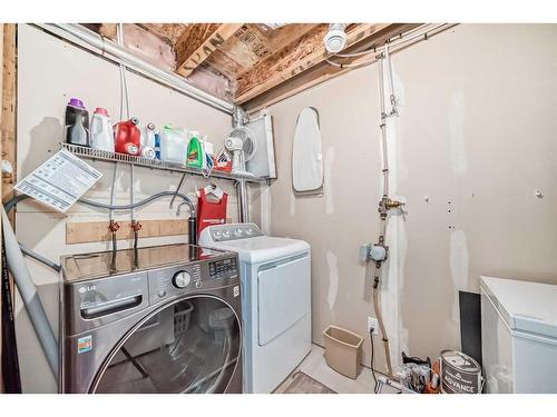 91 Auburn Bay Boulevard Se, Calgary, AB - Indoor Photo Showing Laundry Room