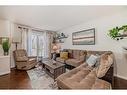 91 Auburn Bay Boulevard Se, Calgary, AB  - Indoor Photo Showing Living Room 