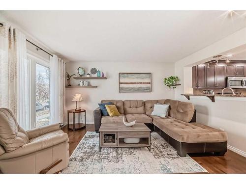 91 Auburn Bay Boulevard Se, Calgary, AB - Indoor Photo Showing Living Room