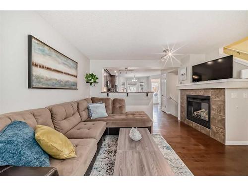 91 Auburn Bay Boulevard Se, Calgary, AB - Indoor Photo Showing Living Room With Fireplace