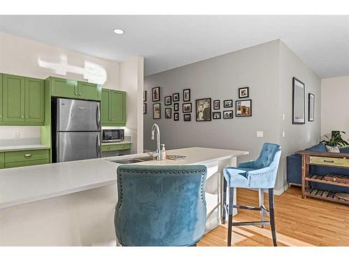 D-6 Otter Lane, Banff, AB - Indoor Photo Showing Kitchen With Double Sink