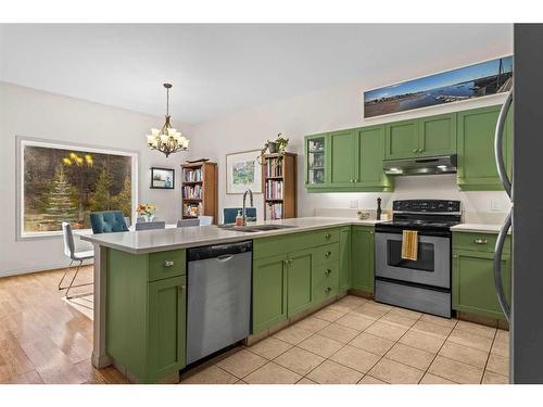 D-6 Otter Lane, Banff, AB - Indoor Photo Showing Kitchen With Double Sink