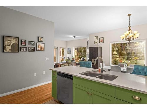 D-6 Otter Lane, Banff, AB - Indoor Photo Showing Kitchen With Double Sink