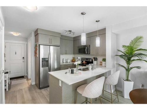 6406-302 Skyview Ranch Drive Ne, Calgary, AB - Indoor Photo Showing Kitchen With Stainless Steel Kitchen With Double Sink With Upgraded Kitchen