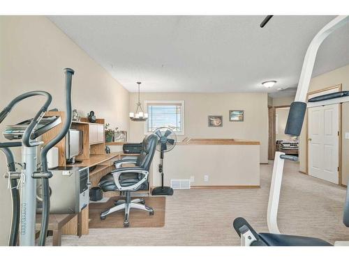 152 Del Ray Close Ne, Calgary, AB - Indoor Photo Showing Gym Room