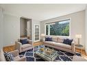 543 Regal Park Ne, Calgary, AB  - Indoor Photo Showing Living Room 