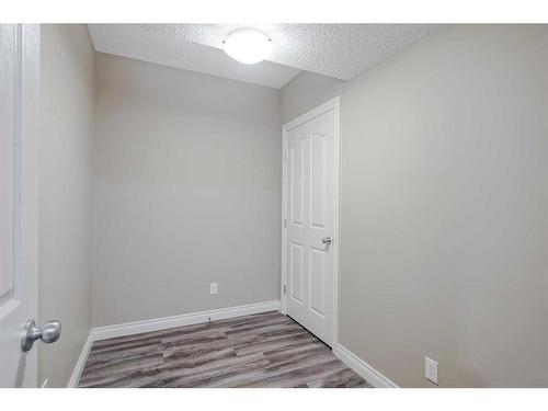 146 Evanspark Circle Nw, Calgary, AB - Indoor Photo Showing Other Room