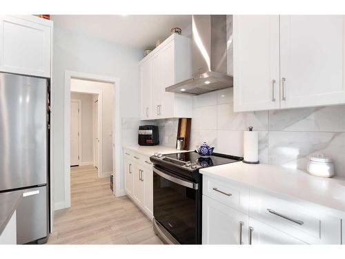 118 Ranchers View, Okotoks, AB - Indoor Photo Showing Kitchen