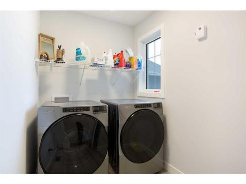 118 Ranchers View, Okotoks, AB - Indoor Photo Showing Laundry Room