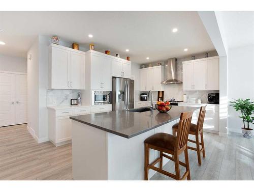 118 Ranchers View, Okotoks, AB - Indoor Photo Showing Kitchen With Stainless Steel Kitchen With Upgraded Kitchen