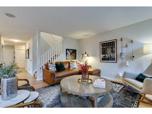 74 Silverado Range Heights Sw, Calgary, AB - Indoor Photo Showing Living Room