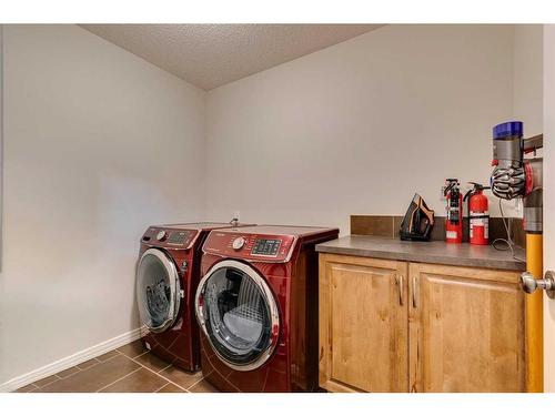 74 Silverado Range Heights Sw, Calgary, AB - Indoor Photo Showing Laundry Room