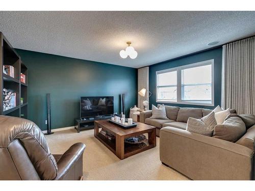 74 Silverado Range Heights Sw, Calgary, AB - Indoor Photo Showing Living Room