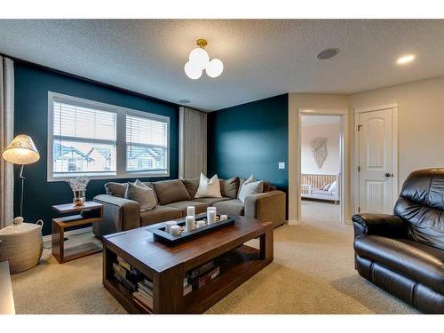 74 Silverado Range Heights Sw, Calgary, AB - Indoor Photo Showing Living Room