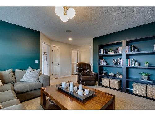 74 Silverado Range Heights Sw, Calgary, AB - Indoor Photo Showing Living Room