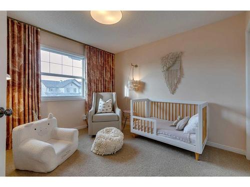 74 Silverado Range Heights Sw, Calgary, AB - Indoor Photo Showing Bedroom