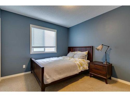 74 Silverado Range Heights Sw, Calgary, AB - Indoor Photo Showing Bedroom