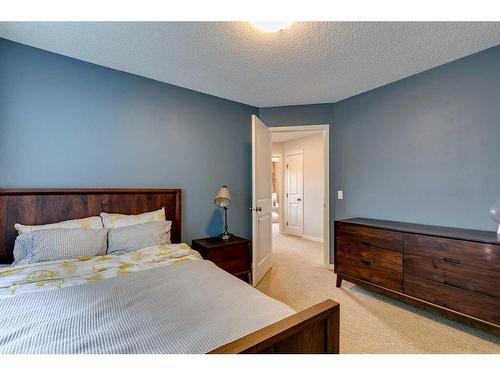 74 Silverado Range Heights Sw, Calgary, AB - Indoor Photo Showing Bedroom