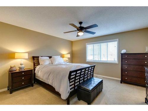 74 Silverado Range Heights Sw, Calgary, AB - Indoor Photo Showing Bedroom