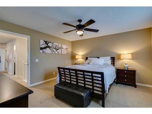 74 Silverado Range Heights Sw, Calgary, AB - Indoor Photo Showing Bedroom